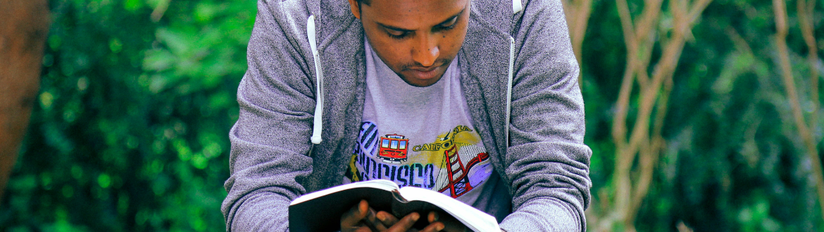 man reading bible