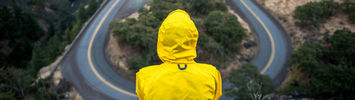 Person in yellow waterproof coat