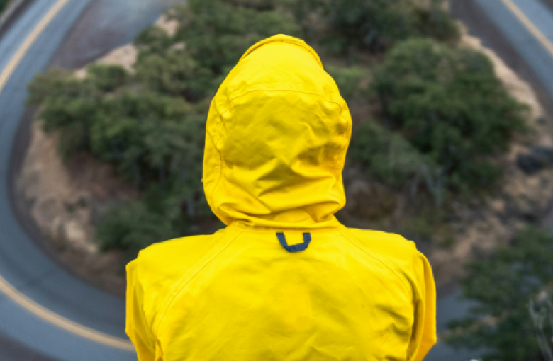 Person in yellow waterproof coat